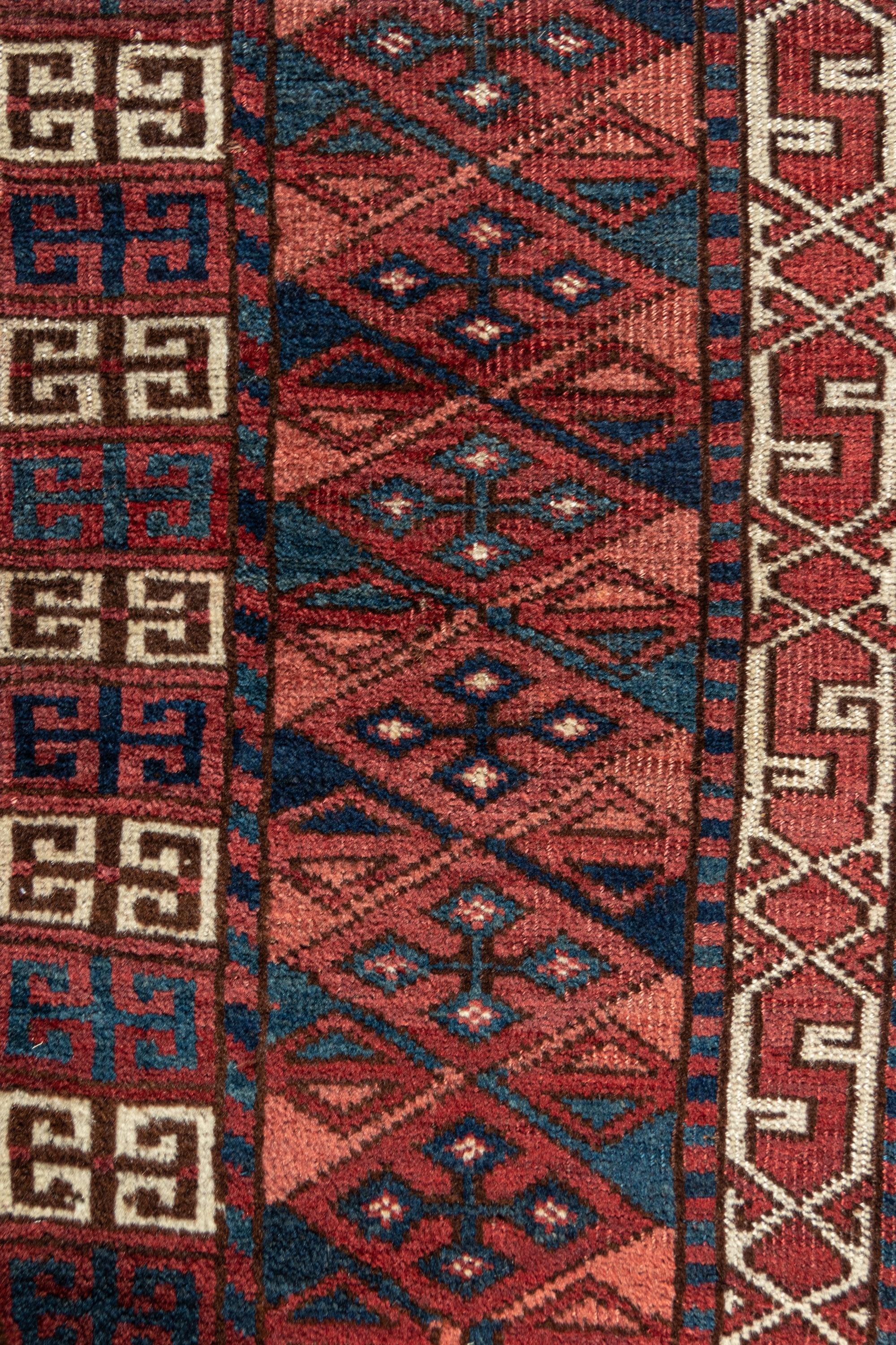 A Turkoman Hatchli Wool Rug
