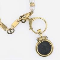 A contemporary 18K yellow gold, cultured pearl, and coin necklace Arezzo Italy