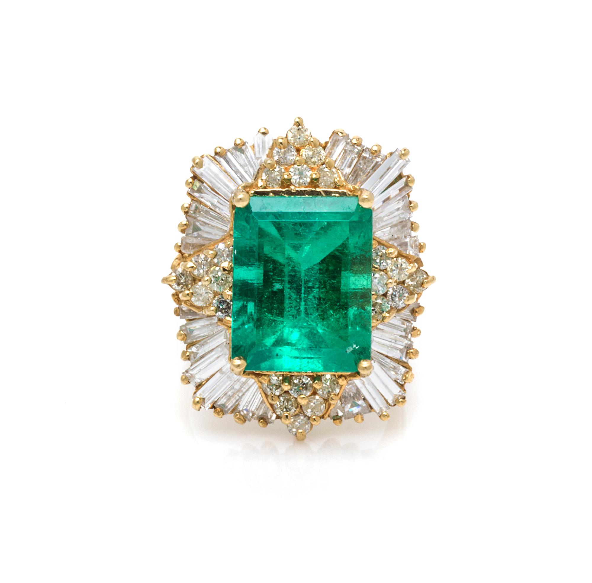 An 18 Karat Yellow Gold, Emerald and Diamond Ring, 9.30 dwts.