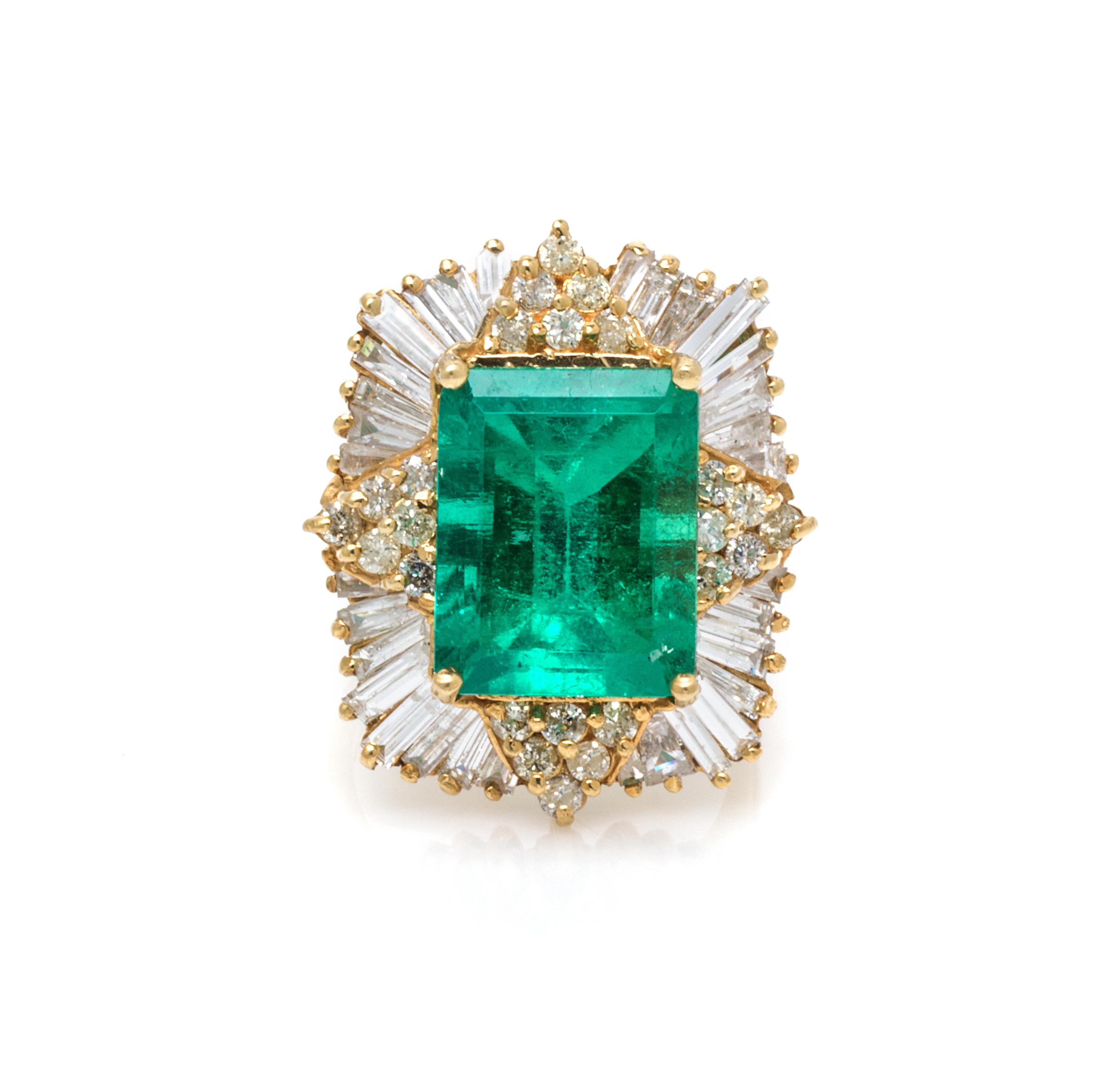 An 18 Karat Yellow Gold, Emerald and Diamond Ring, 9.30 dwts.