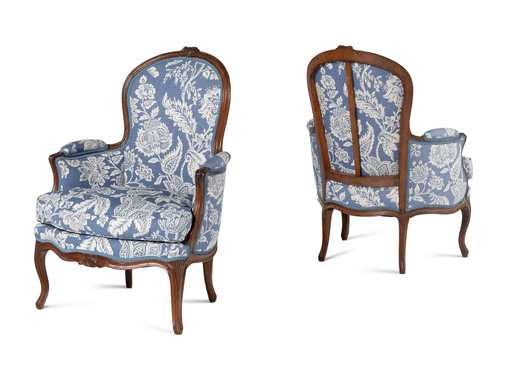 A Pair of Louis XV Walnut Bergères