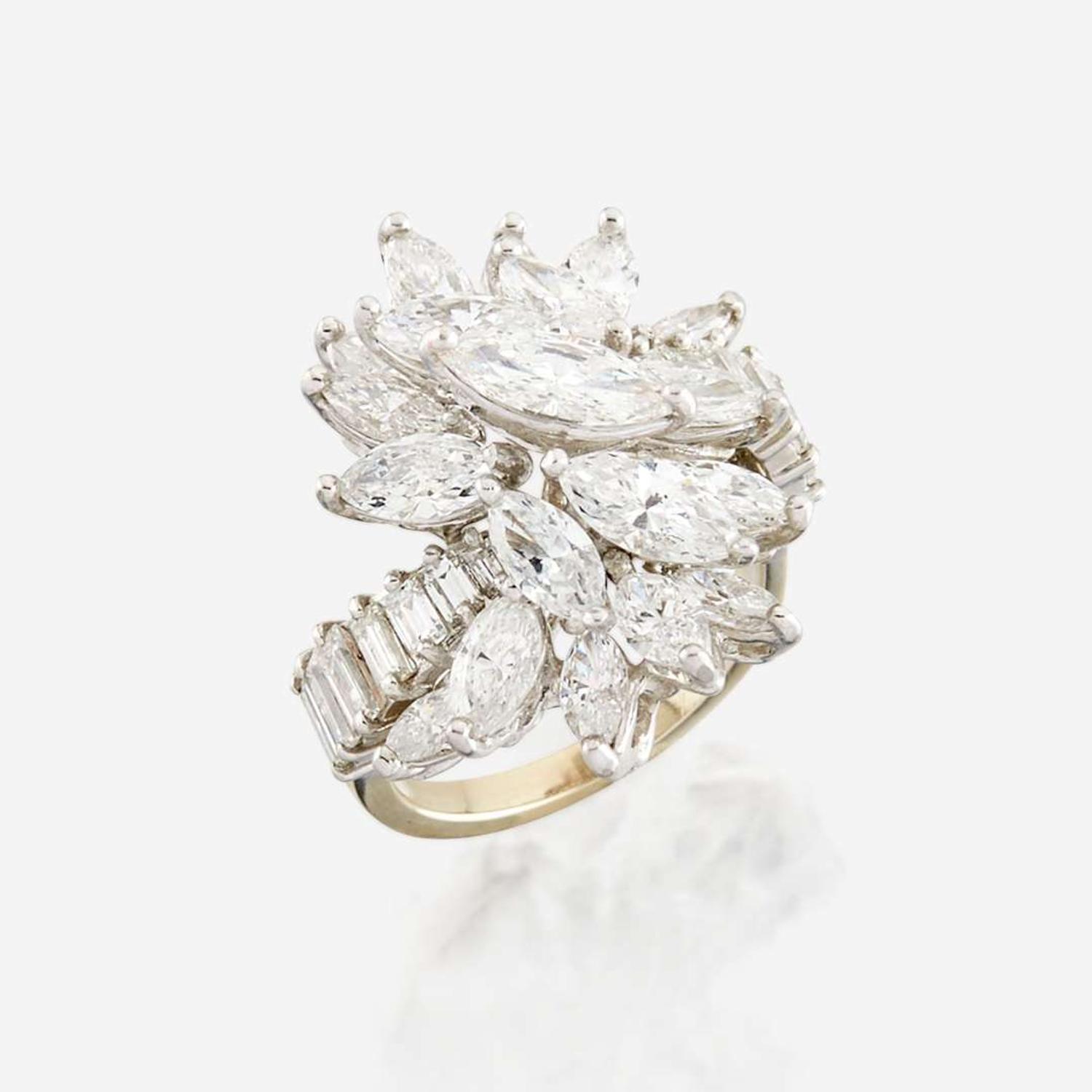 A diamond, platinum, and white metal ring