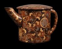 A Japanese Gold Decorated Brown and Red Lacquer Tableware Set