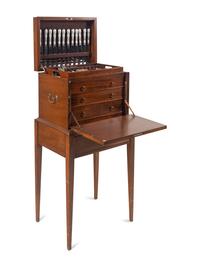 A Tiffany and Co. English King Silver Flatware Service in a Fitted Mahogany Chest