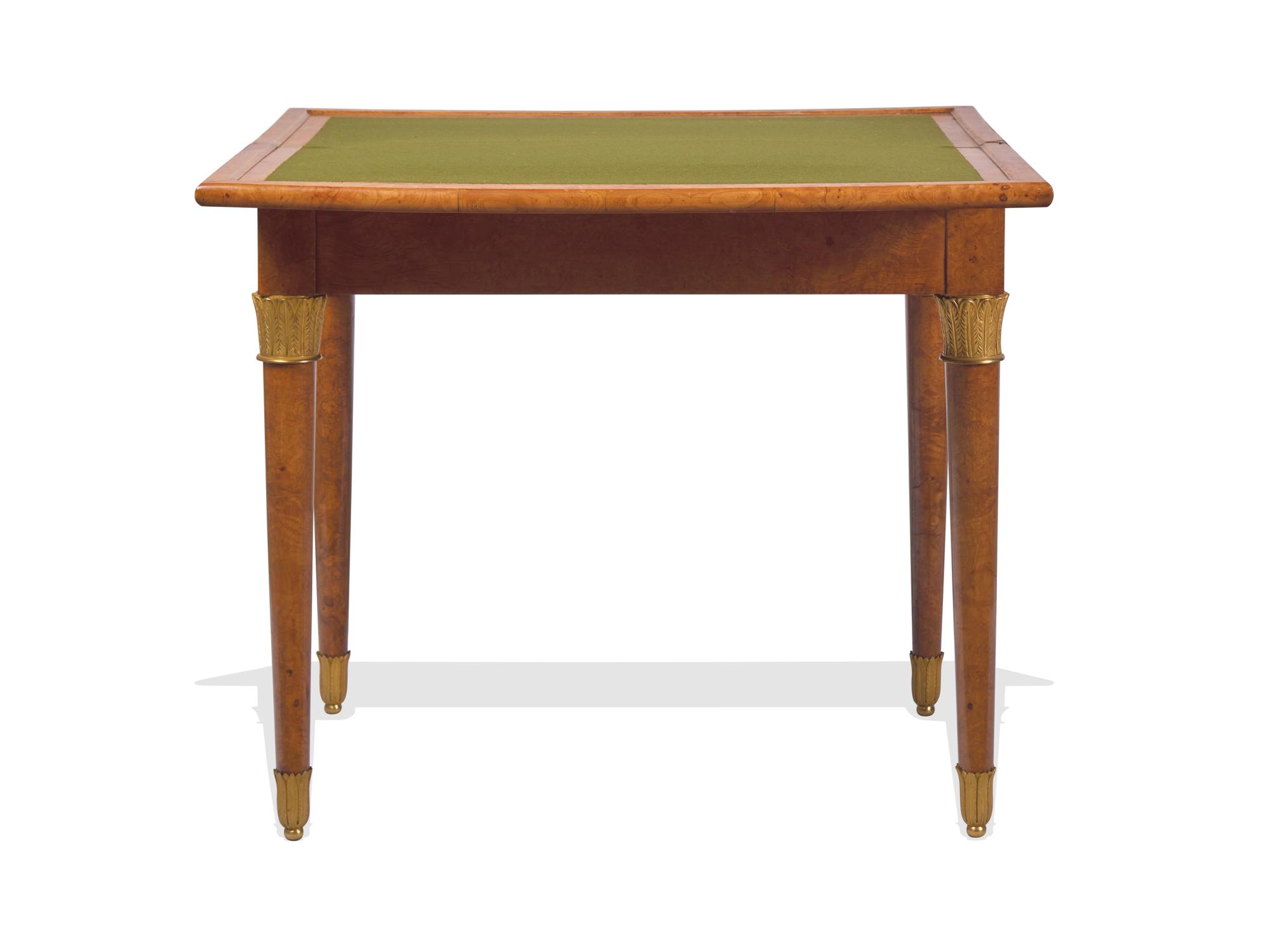 A Charles X Karelian Birch and Gilt-Bronze Mounted Flip-Top Games Table