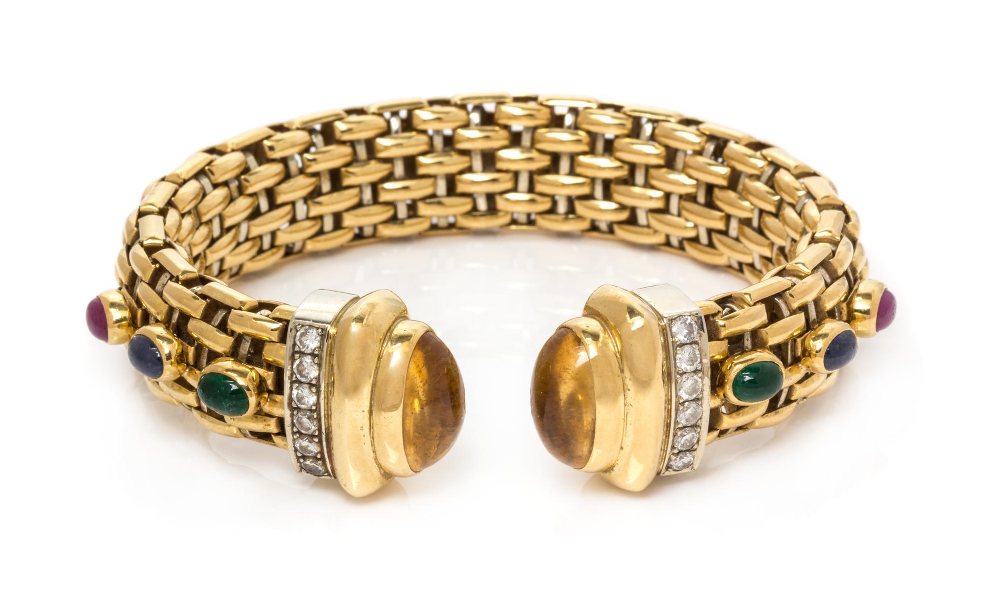 An 18 Karat Bicolor Gold, Multigem and Diamond Cuff Bracelet, OWC, 46.40 dwts.