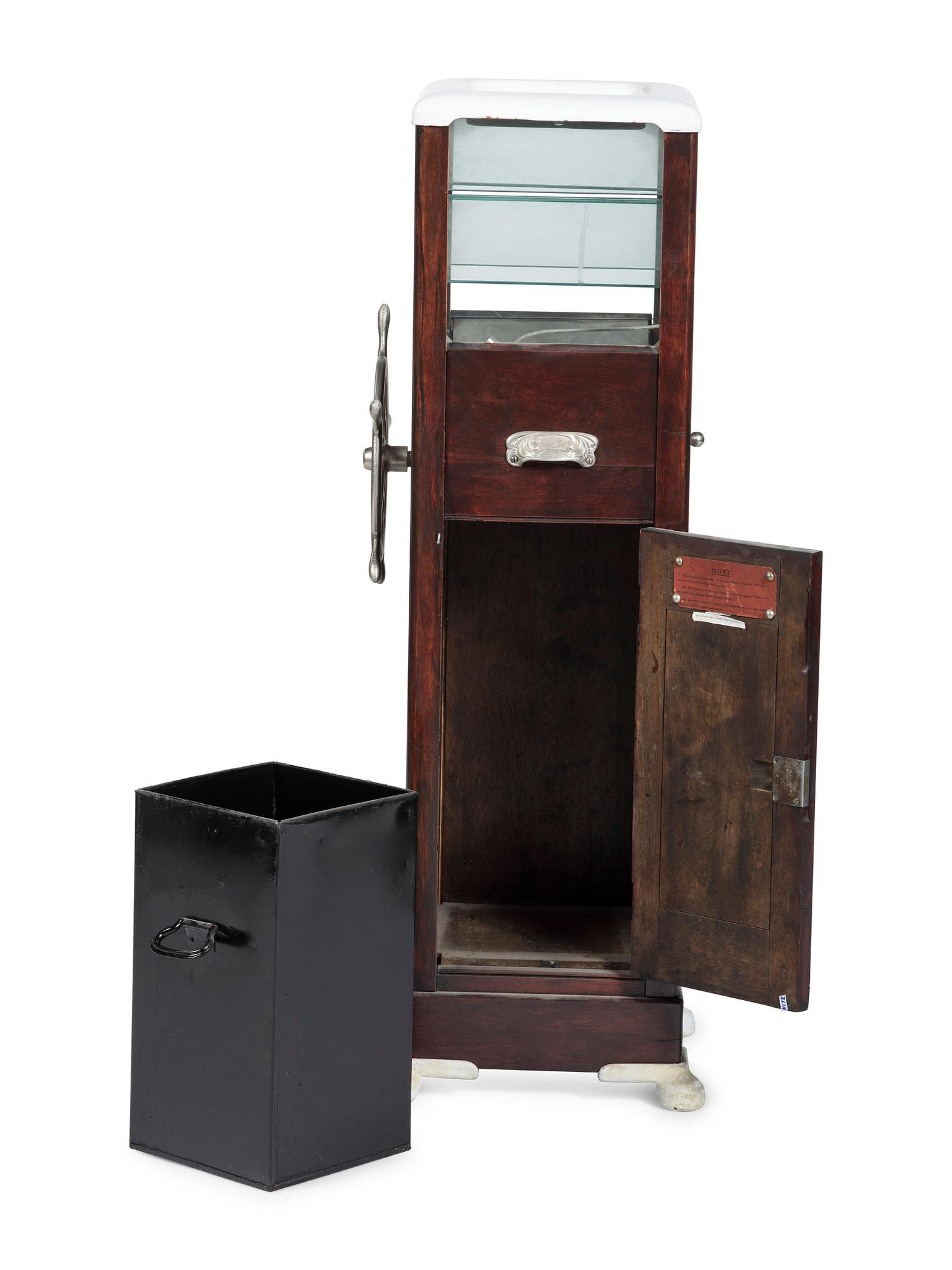 An Enameled Metal Mounted Walnut Floor Model Ticket Shredder
