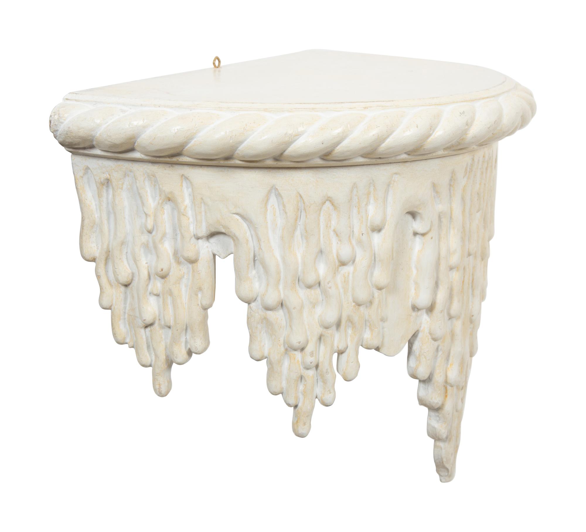 A Pair of White Painted Grotto Style Wall Brackets