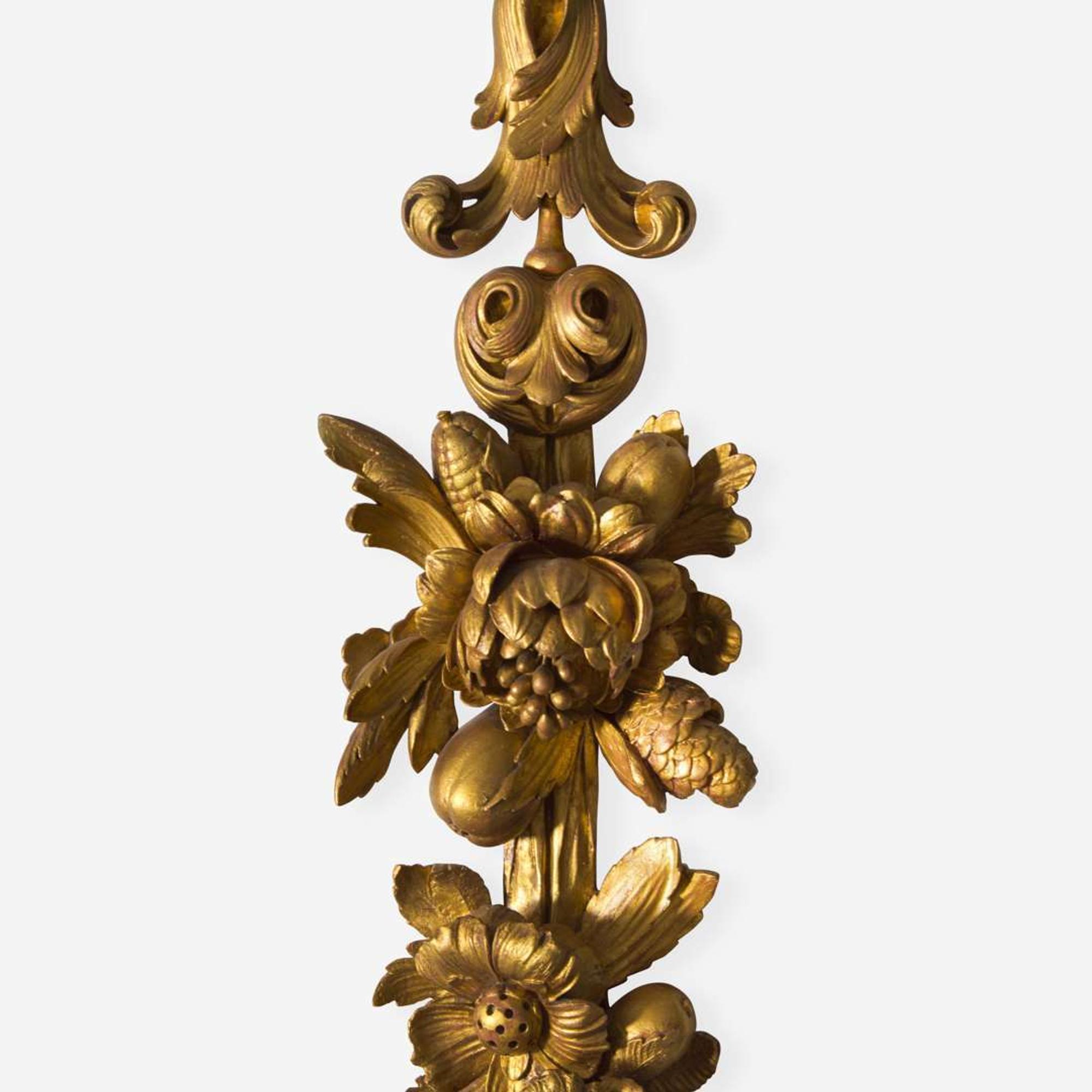A group of four Georgian style giltwood ribbon, fruit, and floral swag wall appliques late 19th / 20th century