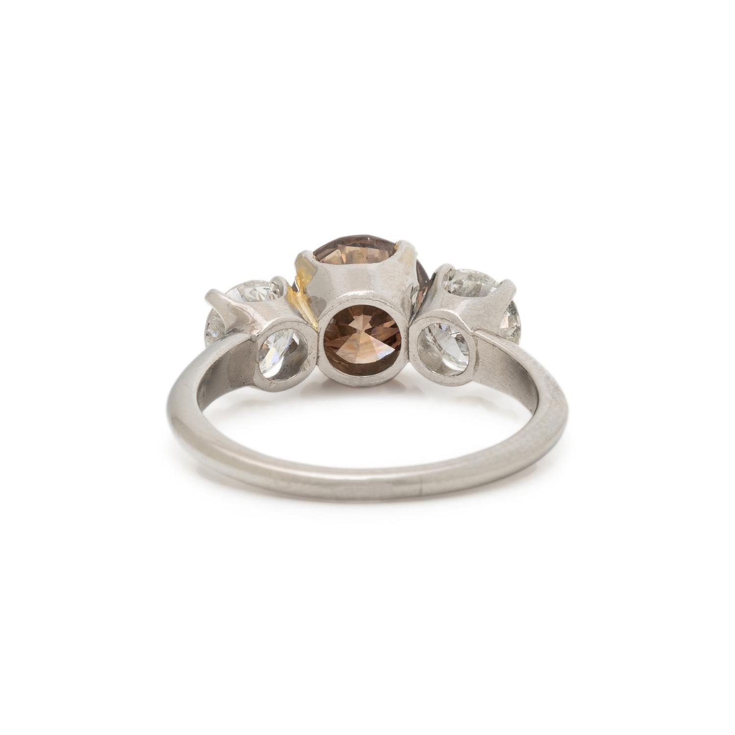 FANCY COLORED DIAMOND AND DIAMOND RING