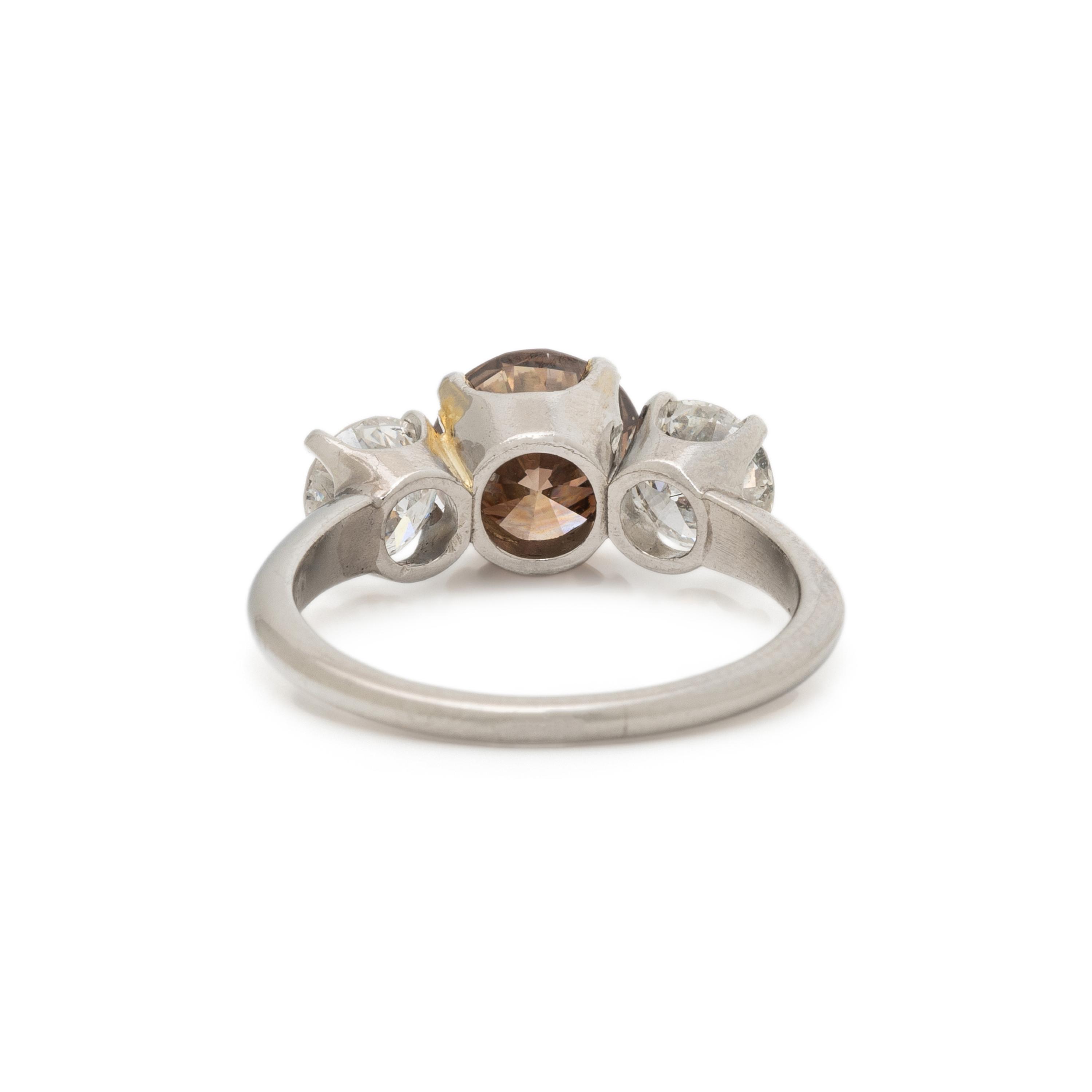 FANCY COLORED DIAMOND AND DIAMOND RING