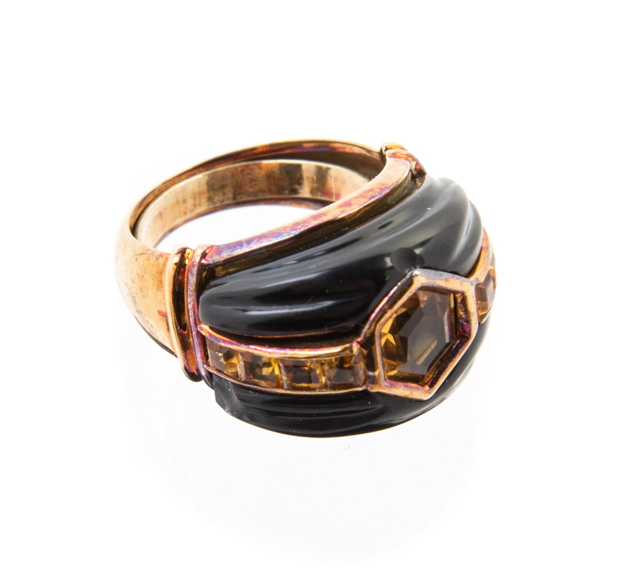 A Collection of 14 Karat Yellow Gold, Onyx and Citrine Jewelry, 23.20 dwts.