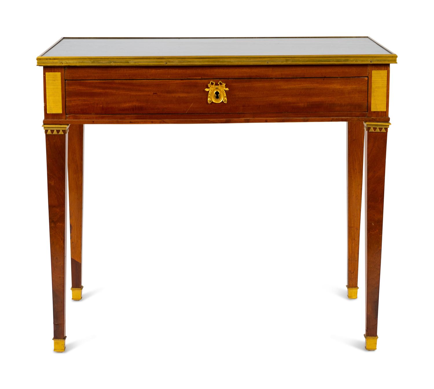 A Louis XVI Style Bronze Mounted Marble Top Writing Table — LATE 19TH CENTURY
