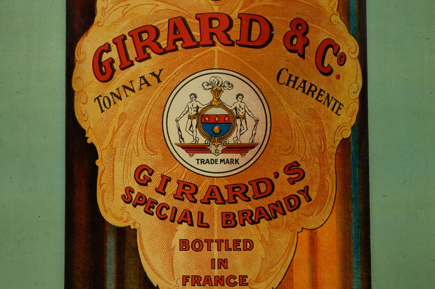 A Porcelain Girard’s Brandy Sign