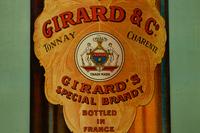 A Porcelain Girard’s Brandy Sign
