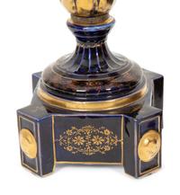 A Pair of Sèvres Style Porcelain Urns Mounted as Lamps