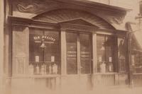 A group of four photographs ( Untitled [man at fountain], circa 1900s; Boutique empire, 14 rue de Grammont , 1903-1904; Hôtel de Neuville, rue Alphonse de Neuville, 1905-1906; Fontaine, faubourg Saint-Martin, 1912)