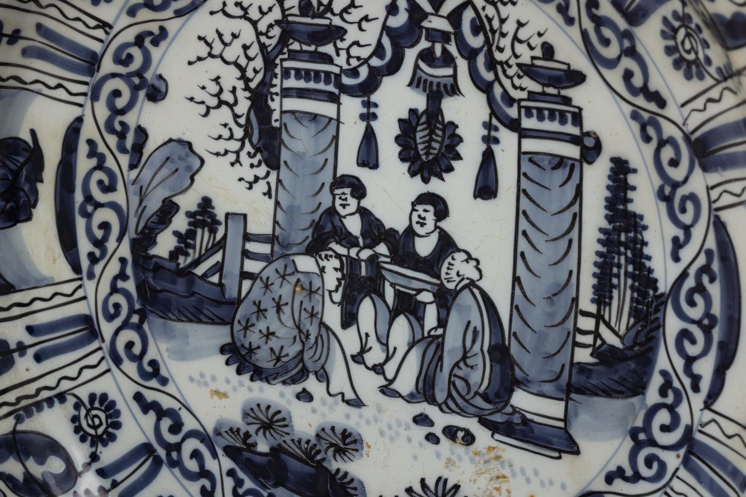 A Delft Pottery Charger and a Chinese Export Kraak Ware Charger