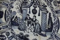 A Delft Pottery Charger and a Chinese Export Kraak Ware Charger