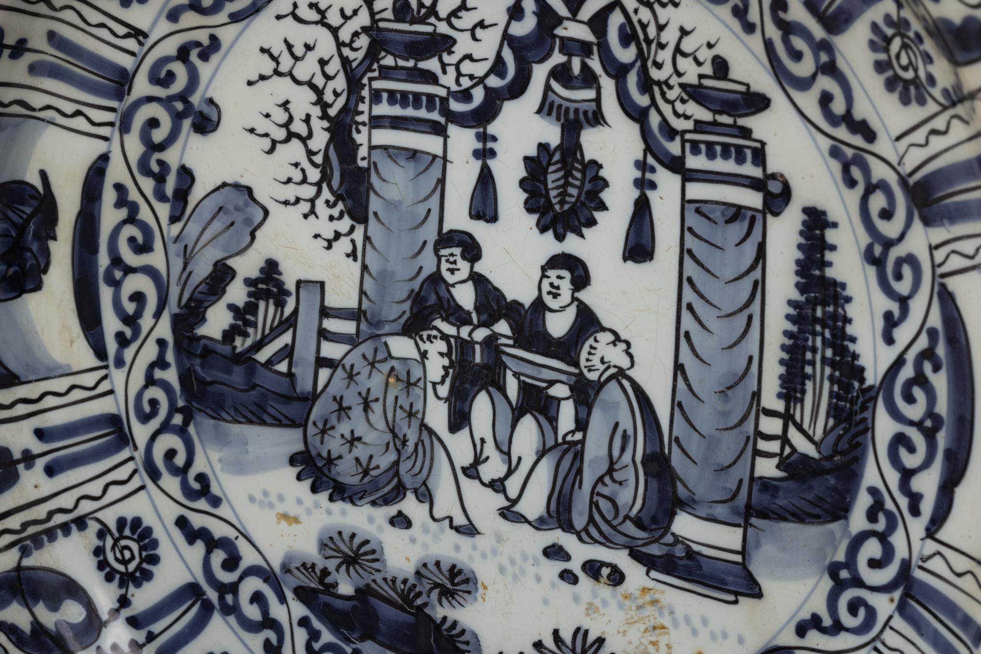 A Delft Pottery Charger and a Chinese Export Kraak Ware Charger
