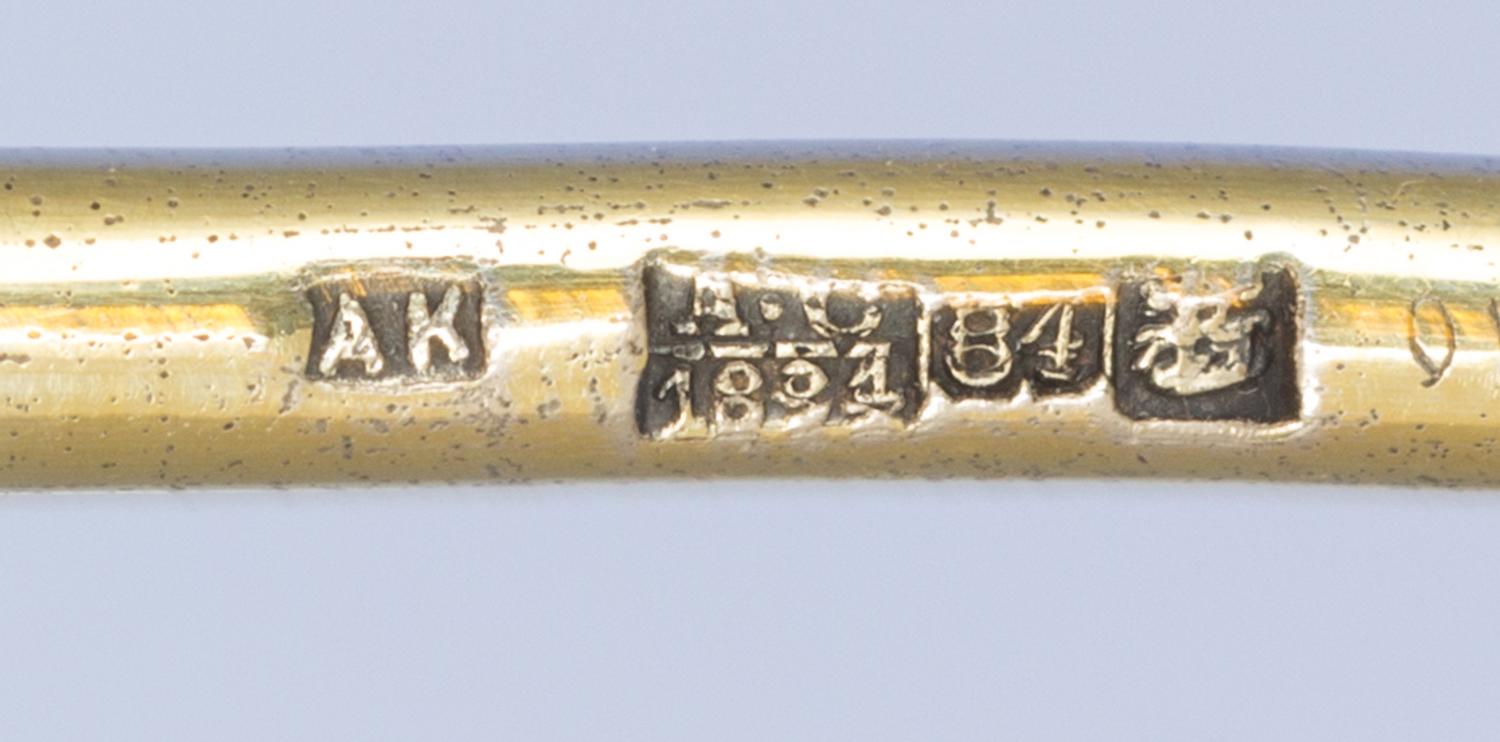 A Russian Silver-Gilt and Niello Spoon, Mark of Antip Kuzmichev for Tiffany & Co., assay mark of A. Smirnov., Moscow, 1881, having a fo