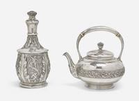 A Continental repoussé silver carafe and a sterling silver teapot, the teapot by Tiffany & Co., New York, NY, 1873-1891