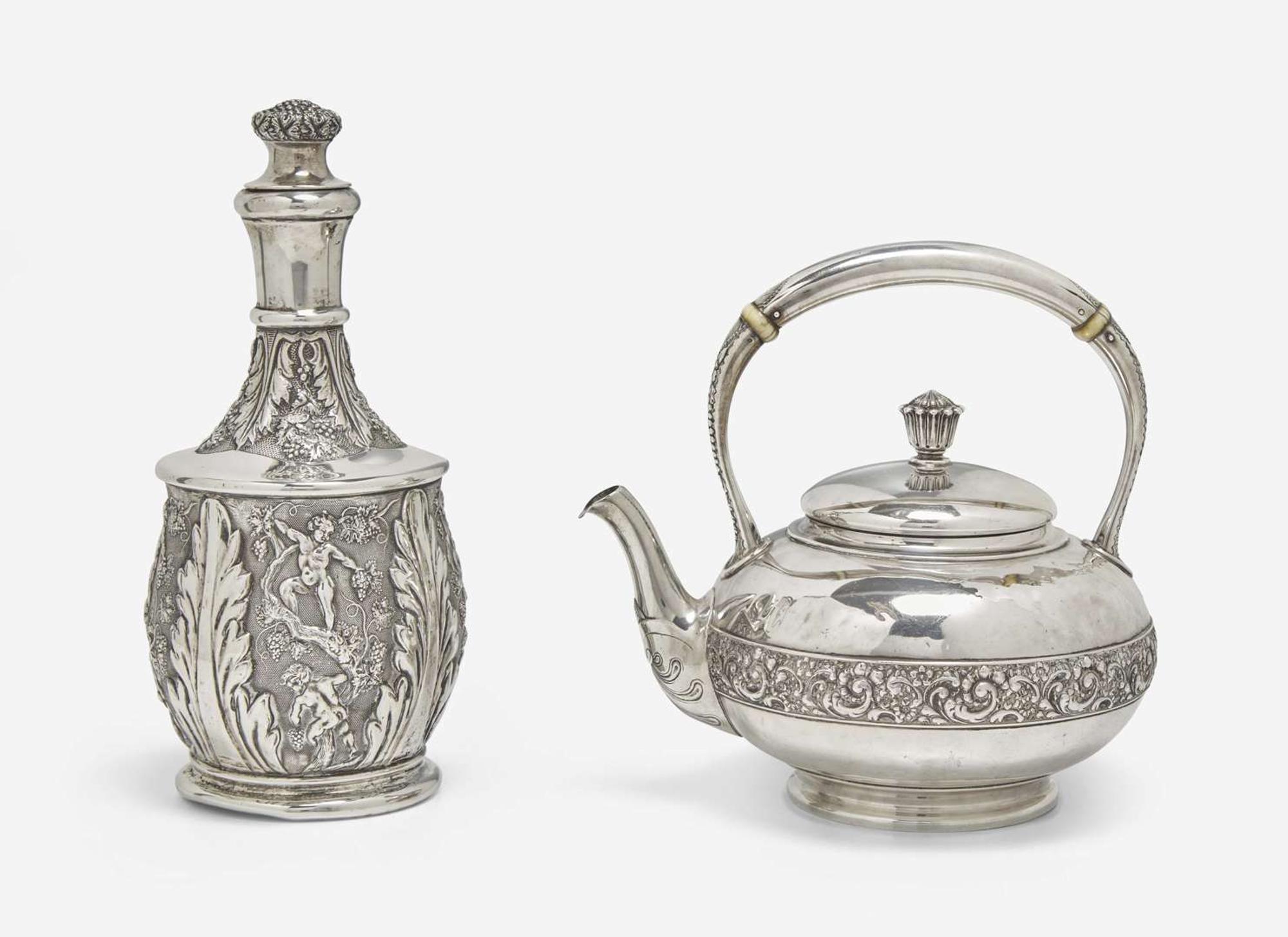A Continental repoussé silver carafe and a sterling silver teapot, the teapot by Tiffany & Co., New York, NY, 1873-1891