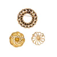 COLLECTION OF YELLOW GOLD BROOCHES