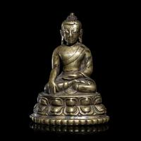 A Tibetan Copper Alloy Figure of Buddha Shakyamuni, 14th/15th Century 十四/十五世紀 西藏銅坐佛