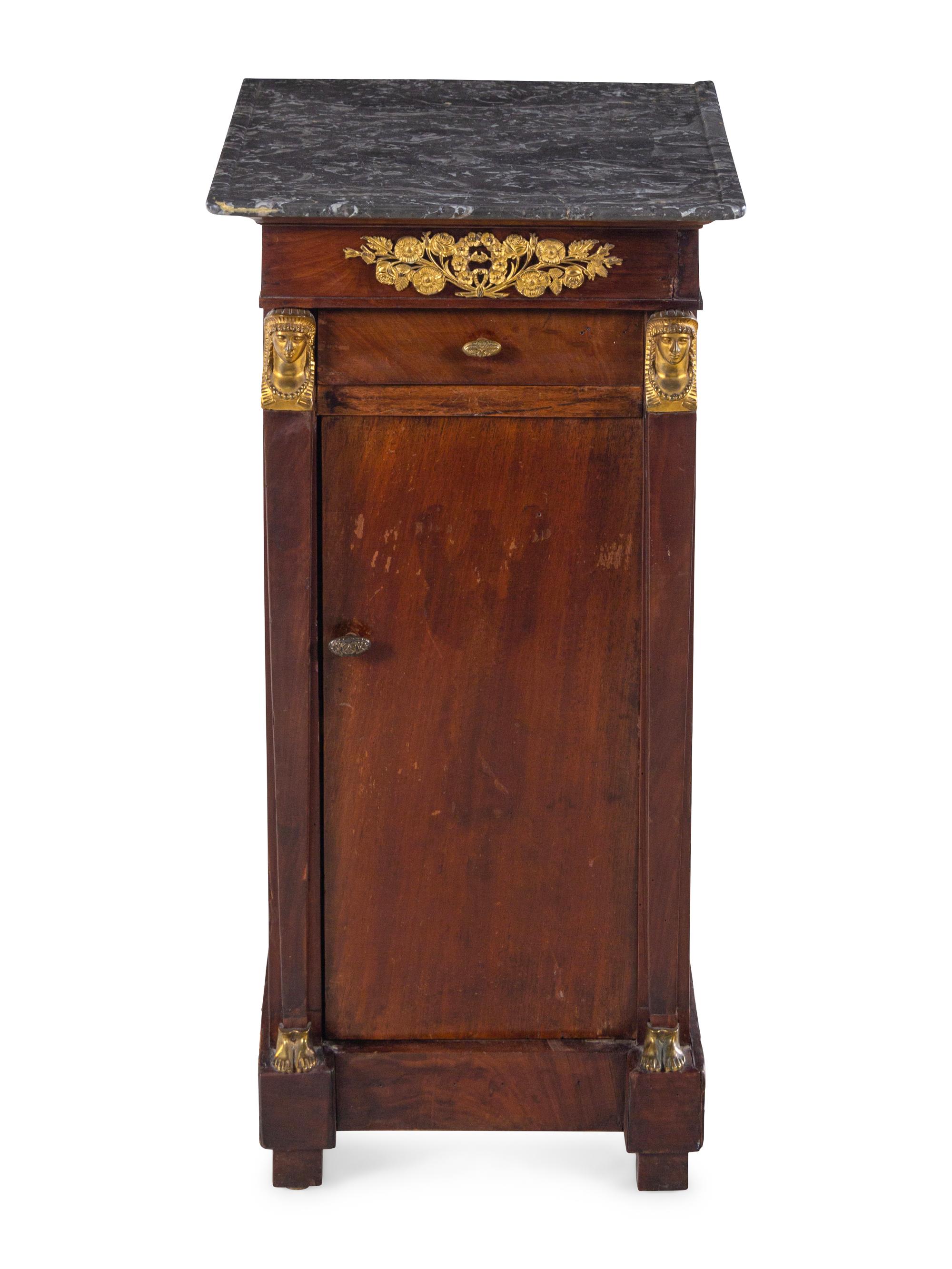 An Empire Style Gilt Metal Mounted Mahogany Side Cabinet