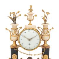 A Directoire Gilt Bronze and Marble Mantel Clock