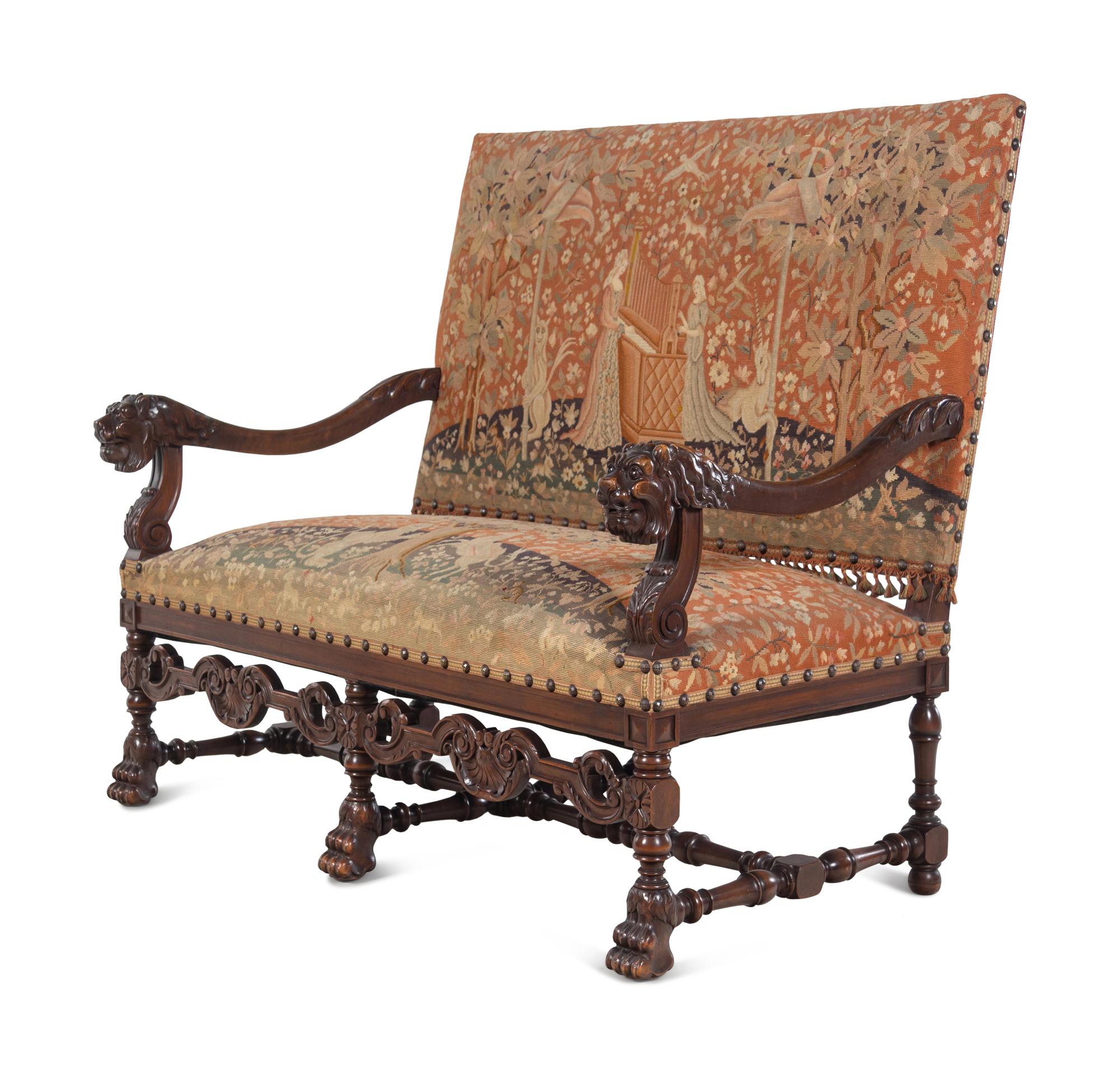 A Renaissance Revival Carved Walnut Parlor Suite