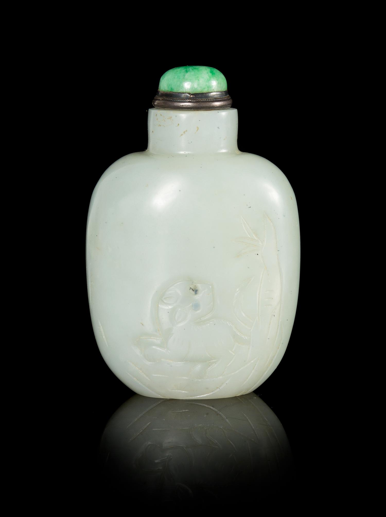 A Celadon Jade Snuff Bottle Height 3 1/4 inches.