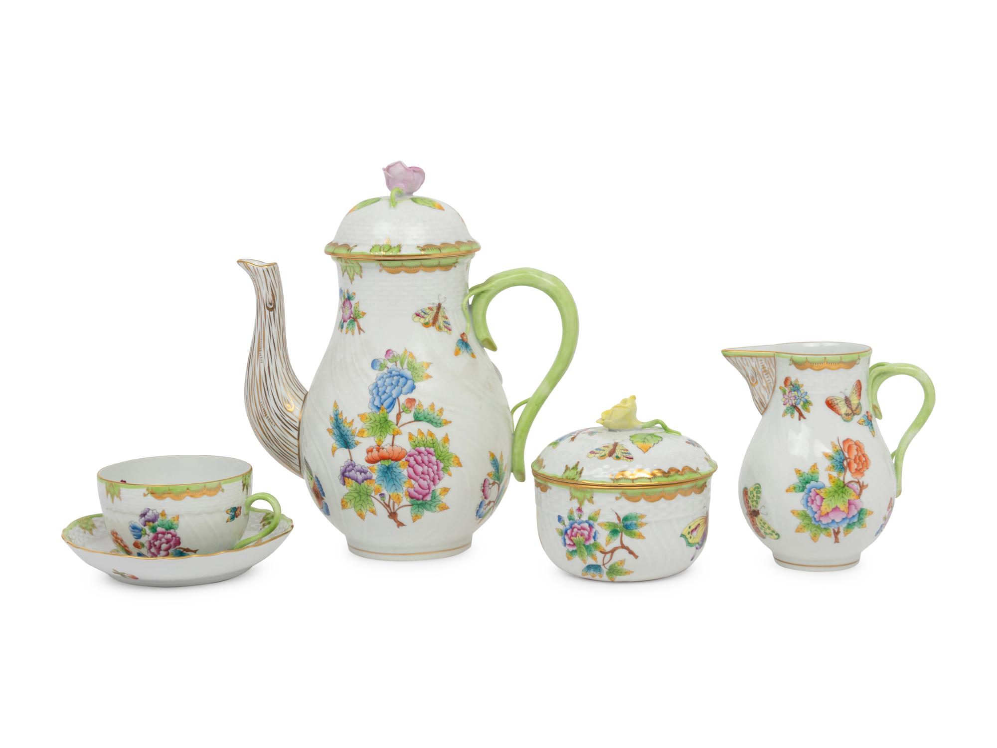 A Herend Queen Victoria Porcelain Dinner Service