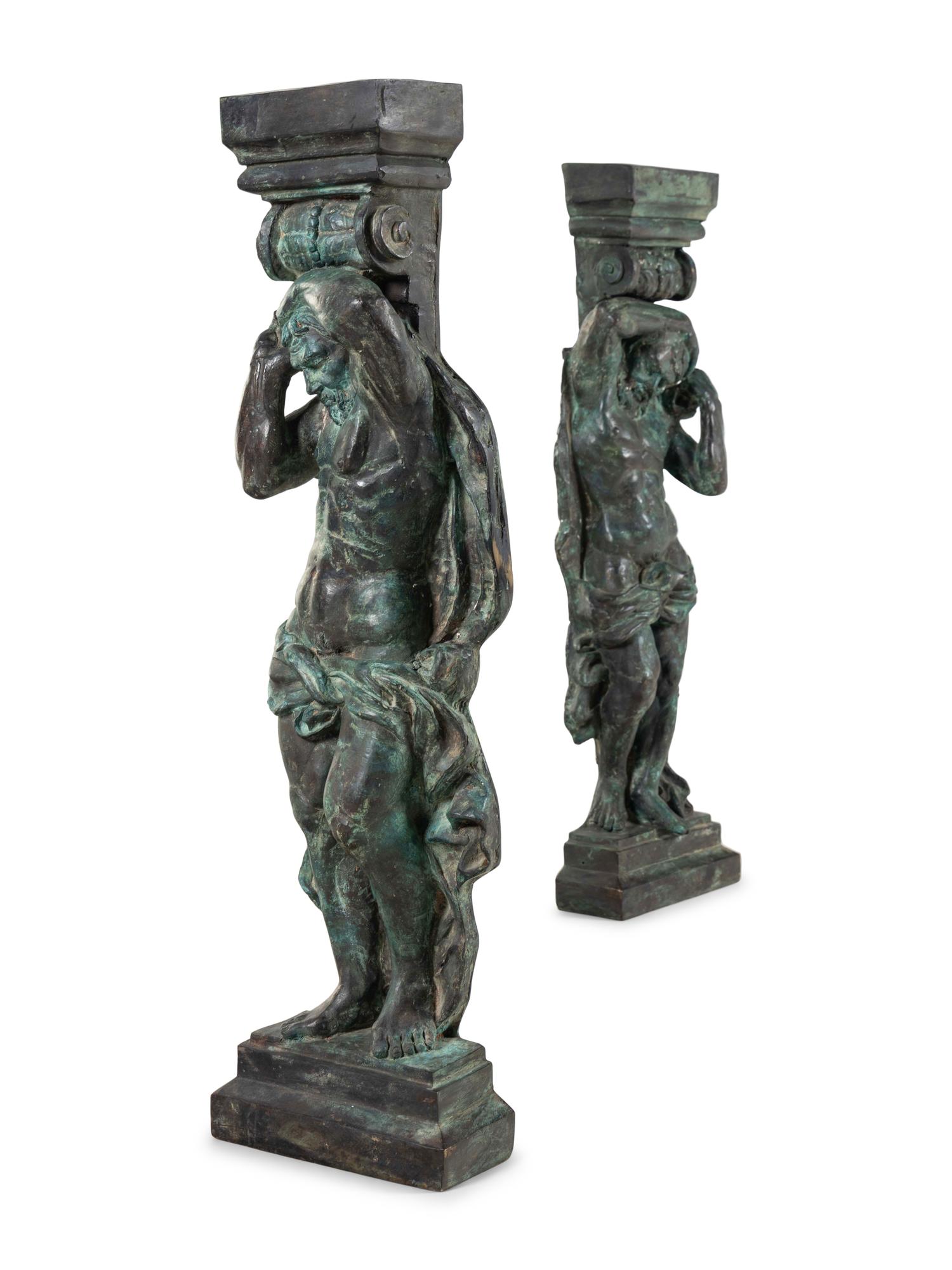 A Pair of Continental Cast Metal Figural Pedestals
