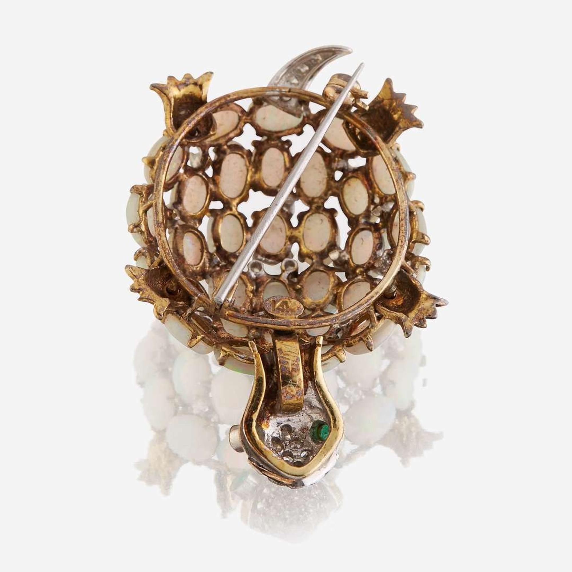 An opal, diamond, emerald, and fourteen karat gold brooch