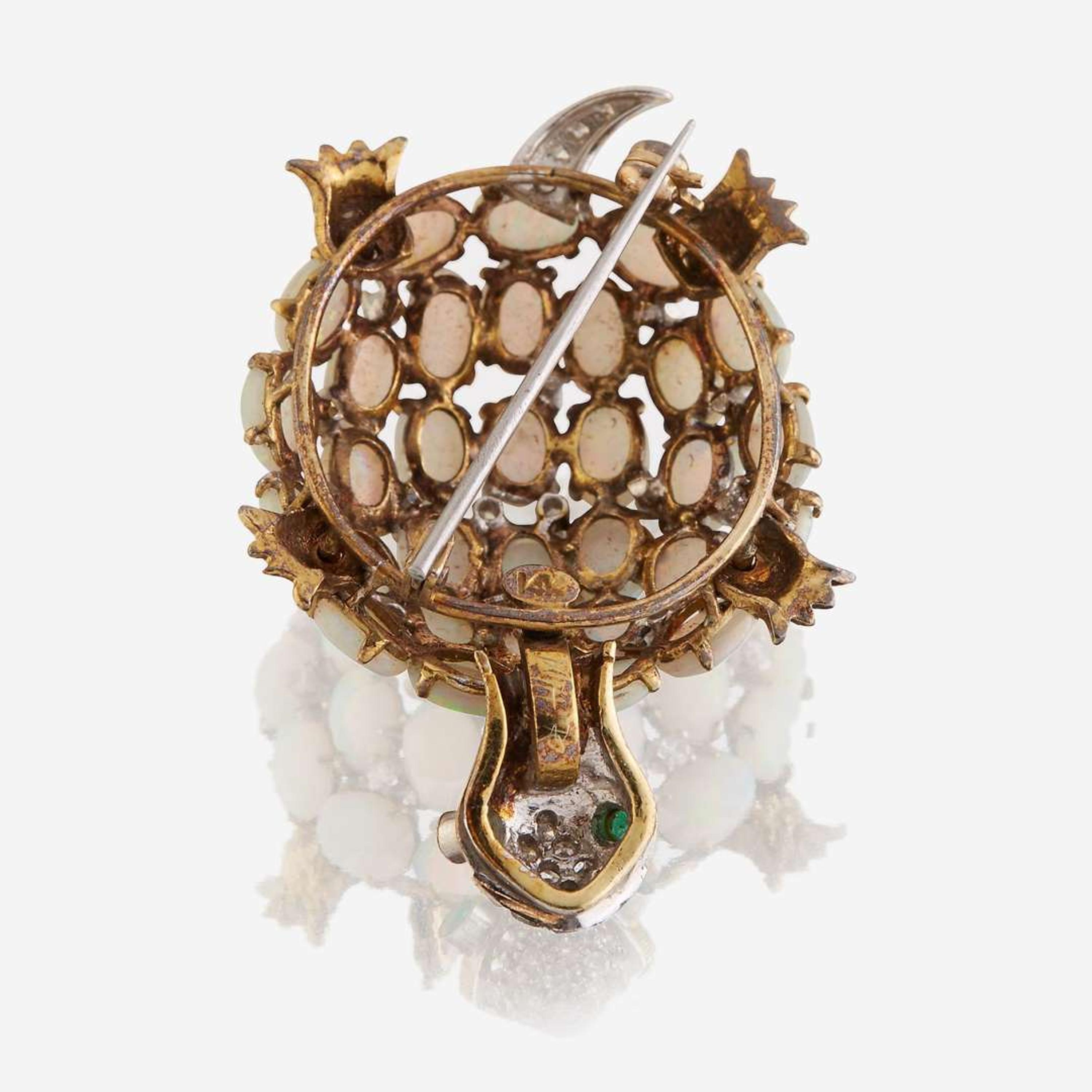 An opal, diamond, emerald, and fourteen karat gold brooch
