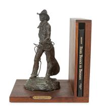 The Bronc Rider , edition 23/100, mounted as bookend; together with book, From Broncs to Bronzes: The Life and Work of Grant Speed by Don Hedgpeth