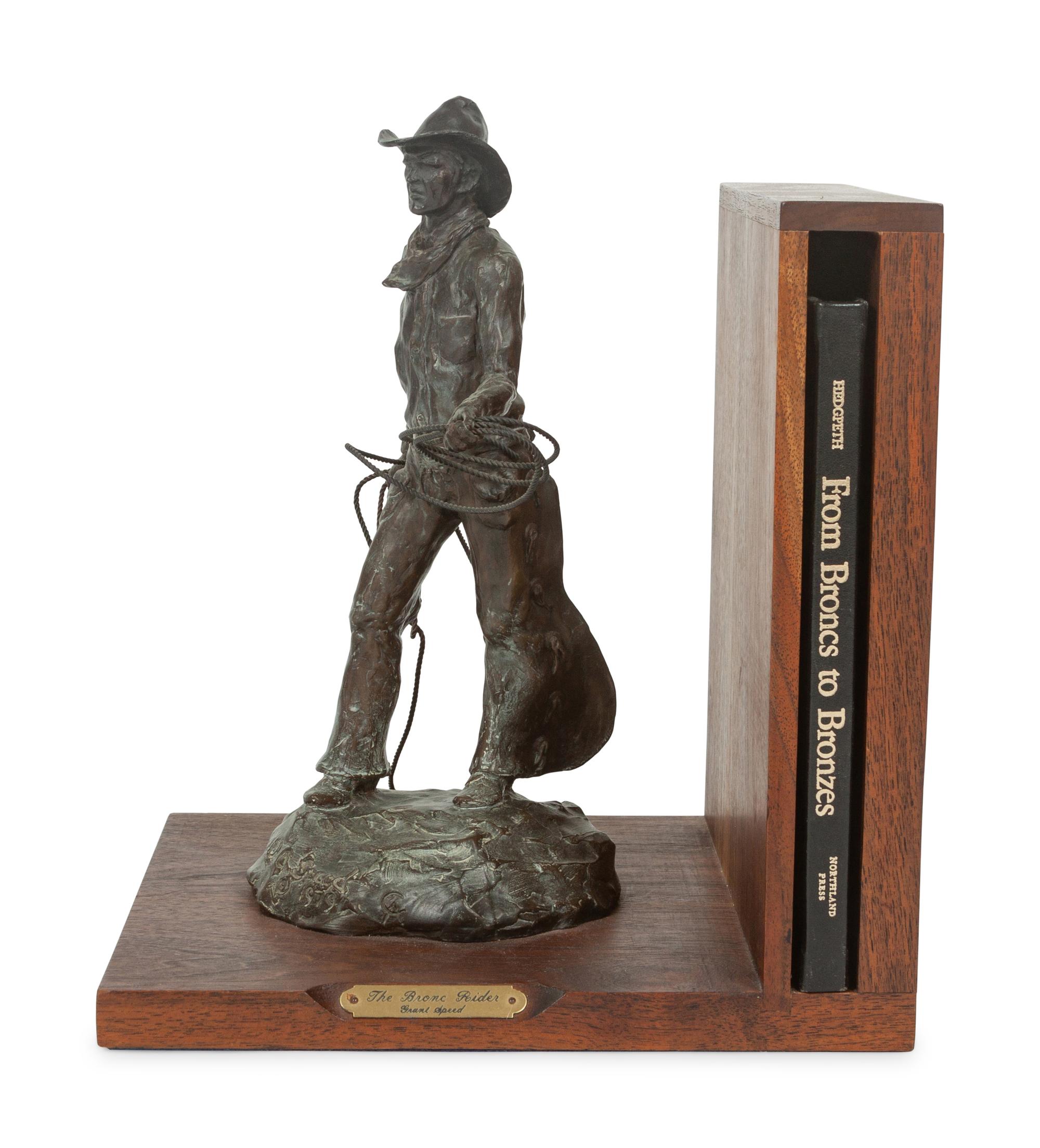 The Bronc Rider , edition 23/100, mounted as bookend; together with book, From Broncs to Bronzes: The Life and Work of Grant Speed by Don Hedgpeth