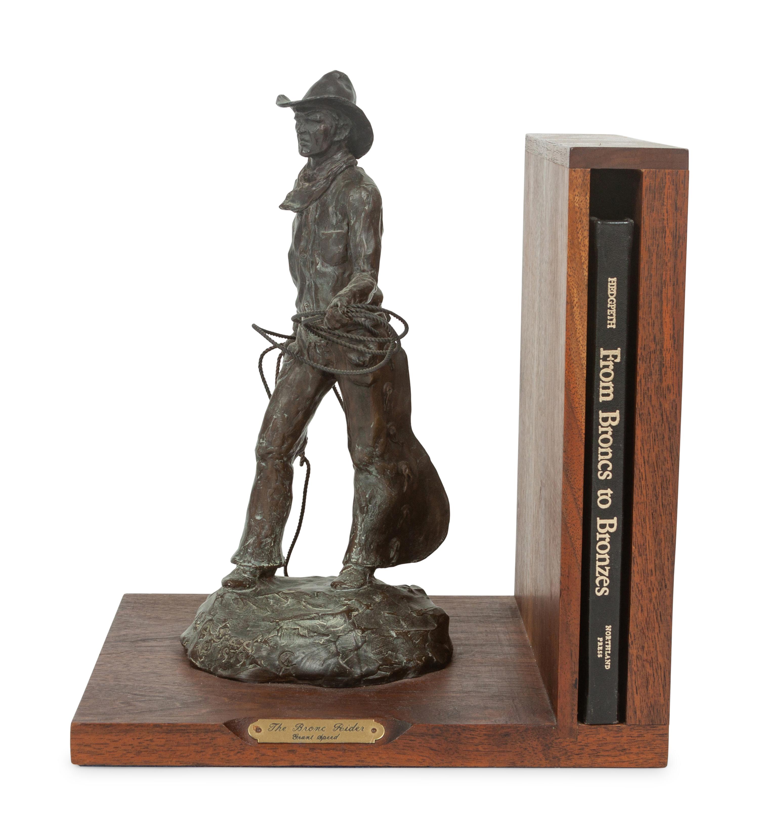 The Bronc Rider , edition 23/100, mounted as bookend; together with book, From Broncs to Bronzes: The Life and Work of Grant Speed by Don Hedgpeth