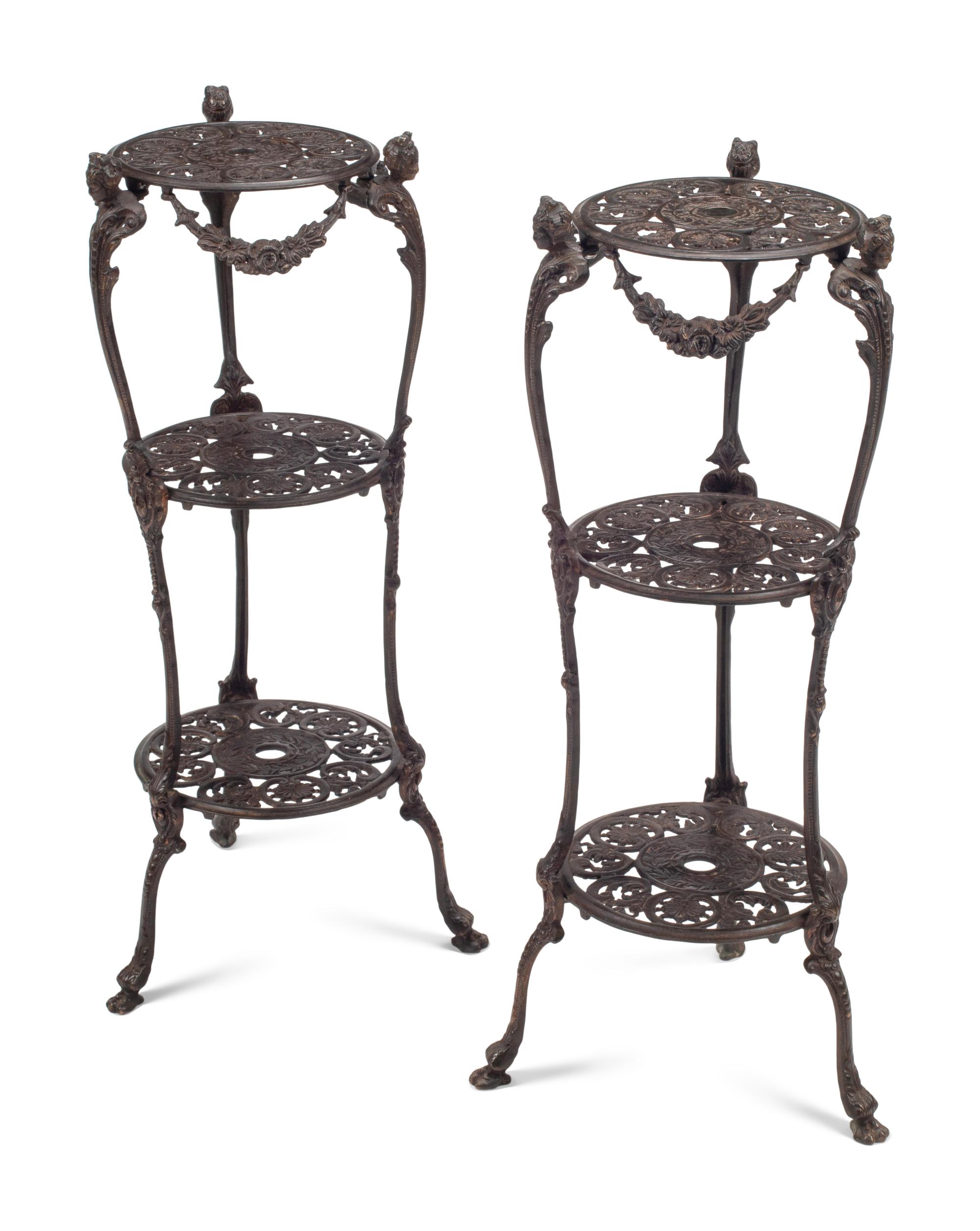 A Pair of Louis XV Style Bronze Three-Tier Figural Stands
