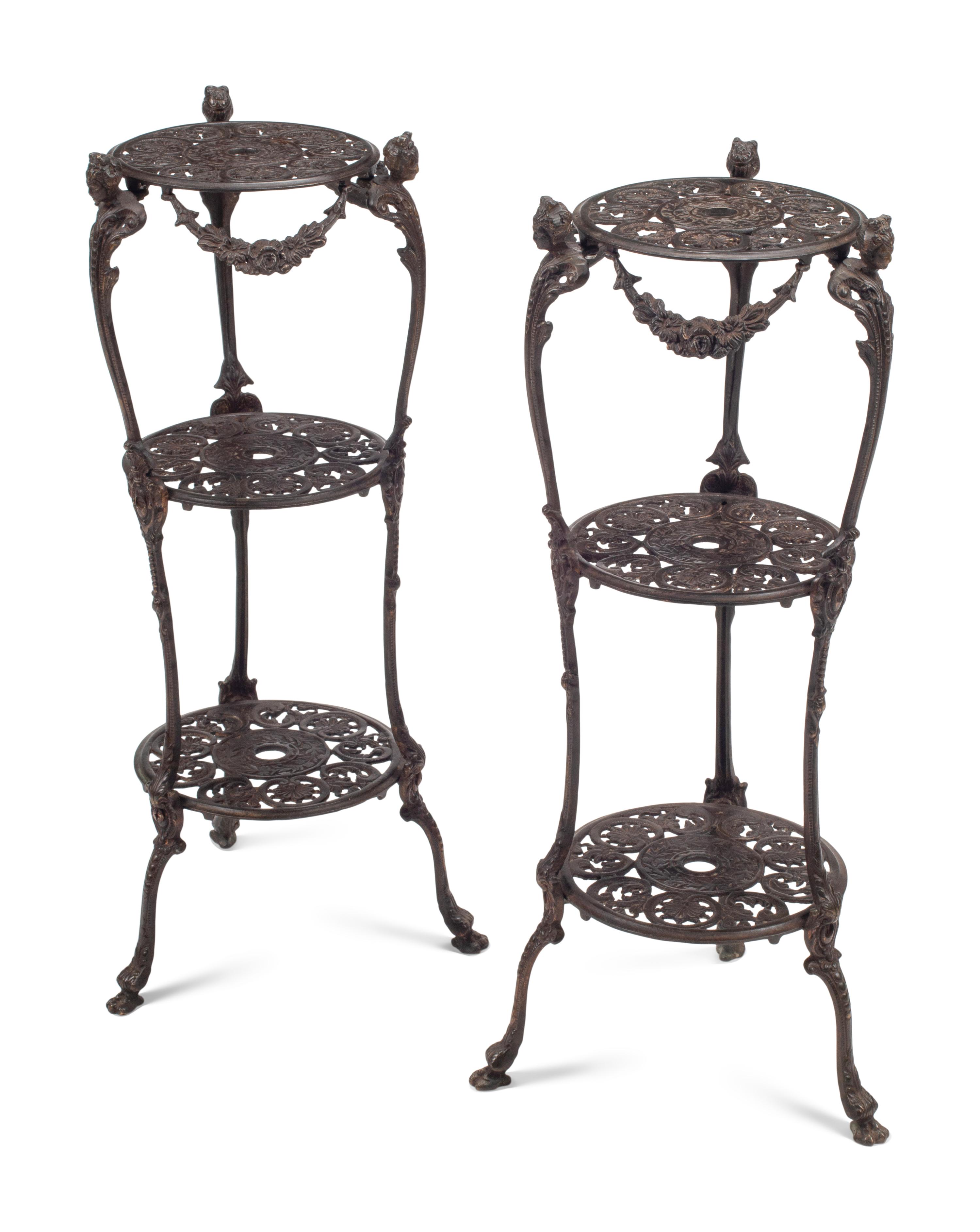 A Pair of Louis XV Style Bronze Three-Tier Figural Stands