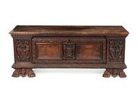 An Italian Carved Walnut Cassone