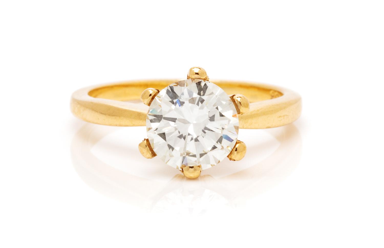 A 14 Karat Yellow Gold and Diamond Solitaire Ring, 2.20 dwts.