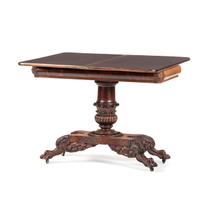 A Classical Carved Mahogany Claw-Foot Game Table