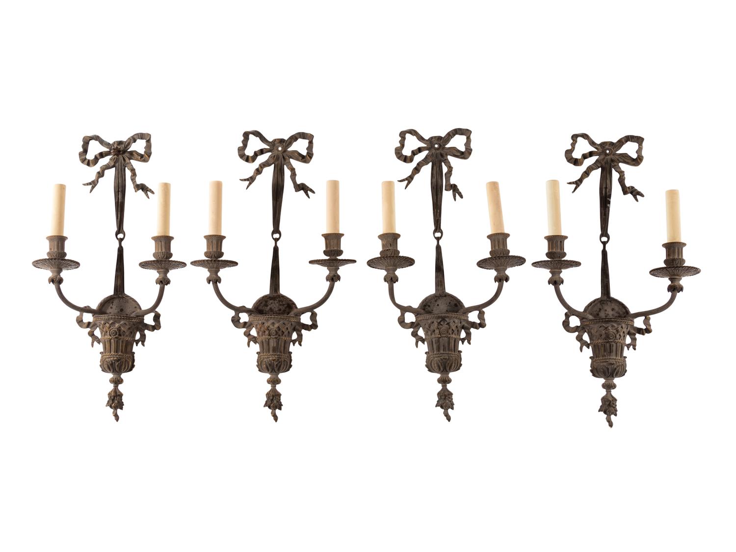 A Set of Four Louis XVI Style Gilt Bronze Two-Light Sconces