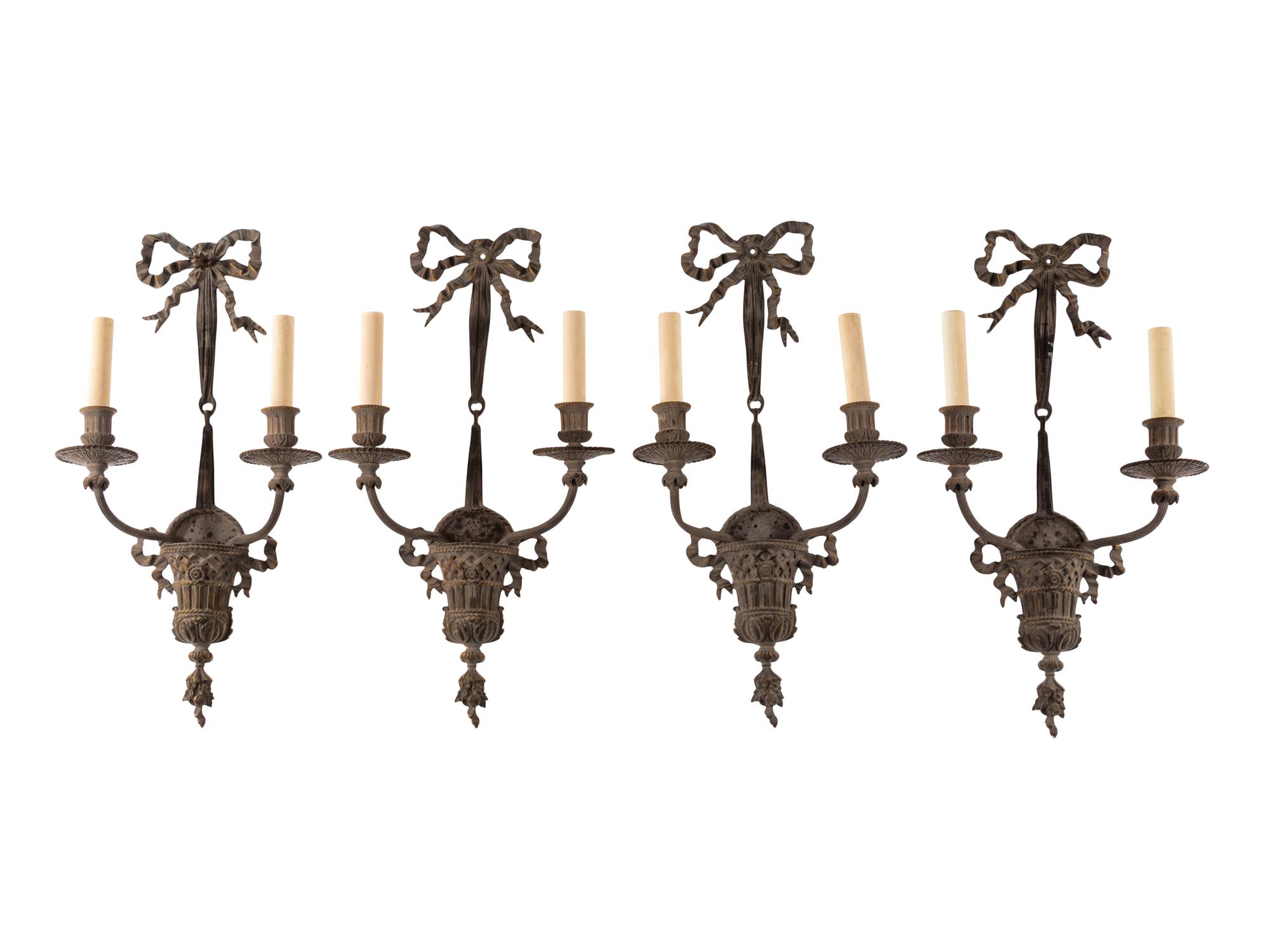 A Set of Four Louis XVI Style Gilt Bronze Two-Light Sconces