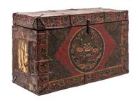 A Tibetan Painted Leather Chest Height 16 1/4 x width 26 3/4 x depth 10 5/8 inches. — LATE 18TH/EARLY 19TH CENTURY