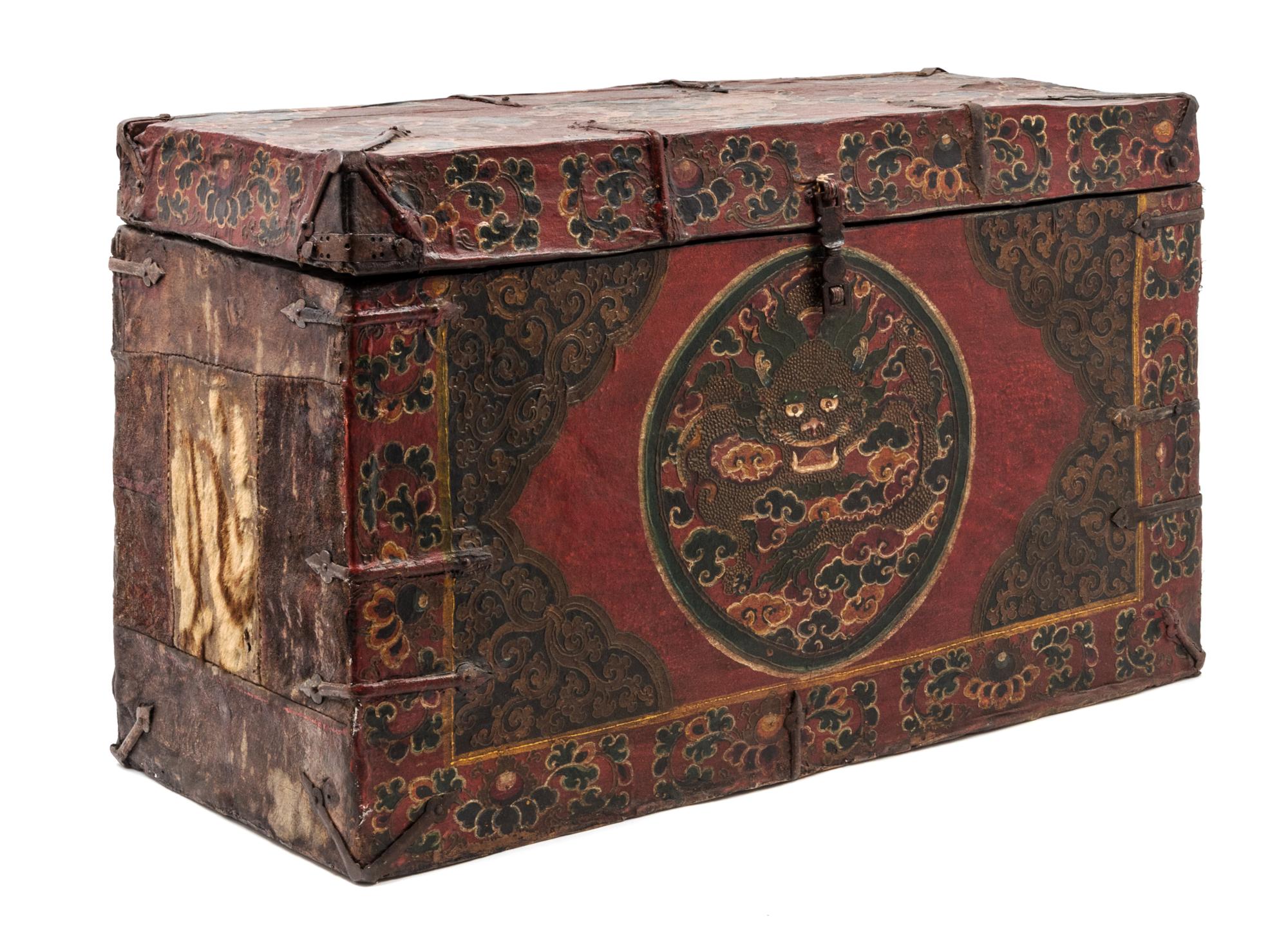 A Tibetan Painted Leather Chest Height 16 1/4 x width 26 3/4 x depth 10 5/8 inches. — LATE 18TH/EARLY 19TH CENTURY