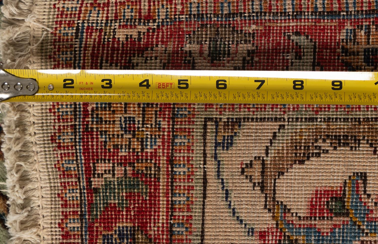 A Tabriz Wool Rug